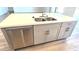 Large kitchen island featuring a stainless steel dishwasher and ample cabinet space at 22270 W Skinner Rd, Wittmann, AZ 85361