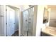 Shower features glass door and tile, and separate door into the bathroom at 22270 W Skinner Rd, Wittmann, AZ 85361