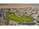 Aerial view of a residential community with a park and playground at 2480 E Haymore St, Gilbert, AZ 85298
