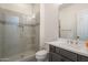 Clean bathroom with a large glass shower and modern vanity at 2480 E Haymore St, Gilbert, AZ 85298