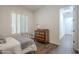Charming bedroom with wood floors and built-in dresser at 2480 E Haymore St, Gilbert, AZ 85298