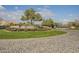 Elegant community entrance with fountain and landscaping at 2480 E Haymore St, Gilbert, AZ 85298