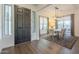 Bright dining area with hardwood floors and chandelier at 2480 E Haymore St, Gilbert, AZ 85298