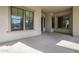 Covered entryway with double doors and windows at 2480 E Haymore St, Gilbert, AZ 85298
