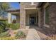 Stone entryway with covered porch and walkway at 2480 E Haymore St, Gilbert, AZ 85298