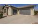 Two-car garage with modern gray doors at 2480 E Haymore St, Gilbert, AZ 85298