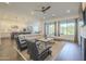 Open concept kitchen boasts a large island, stainless steel appliances, and white shaker cabinets at 2480 E Haymore St, Gilbert, AZ 85298