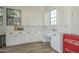 Modern kitchen with white cabinets and quartz countertops at 2480 E Haymore St, Gilbert, AZ 85298