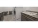 Laundry room with washer, dryer, sink, and storage at 2480 E Haymore St, Gilbert, AZ 85298