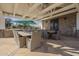 Outdoor patio with a large table and chairs, perfect for entertaining at 2480 E Haymore St, Gilbert, AZ 85298