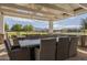 Covered patio with seating area and mountain views at 2480 E Haymore St, Gilbert, AZ 85298
