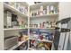 Well-stocked pantry with ample shelving for food storage at 2480 E Haymore St, Gilbert, AZ 85298