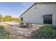 Brick patio with seating area, adjacent to bocce ball and home at 2480 E Haymore St, Gilbert, AZ 85298