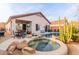 Backyard oasis with a pool, spa, and patio at 26855 N 65Th Ave, Phoenix, AZ 85083