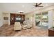 Living room with sliding door access to backyard and comfortable seating at 27211 W Yukon Cir, Buckeye, AZ 85396