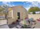 Relaxing patio area with seating and desert plants at 27211 W Yukon Cir, Buckeye, AZ 85396