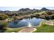 Expansive golf course with glistening pond and desert landscape at 28090 N 108Th Way, Scottsdale, AZ 85262