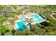 The community offers a large pool with multiple lounge areas, splash pads, and mature landscaping at 30704 N 138Th Ave, Peoria, AZ 85383
