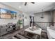 Loft area featuring a ceiling fan, and an entertainment center with sleek furnishings at 30704 N 138Th Ave, Peoria, AZ 85383