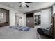 Spacious bedroom featuring a ceiling fan, and offering dual closets with seamless access at 30704 N 138Th Ave, Peoria, AZ 85383