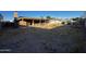 Large backyard with covered patio and storage shed at 3719 W Woodridge Dr, Glendale, AZ 85308