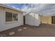White shed with storage space in the backyard at 4102 E Blanche Dr, Phoenix, AZ 85032