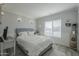 Charming bedroom with a queen bed and decorative wall at 4102 E Blanche Dr, Phoenix, AZ 85032
