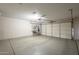 Spacious two-car garage with built-in shelving and ample storage space at 4102 E Blanche Dr, Phoenix, AZ 85032