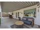 Covered patio with comfortable seating and a view of the backyard at 4102 E Blanche Dr, Phoenix, AZ 85032