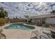 Stunning kidney-shaped pool with a large patio and plenty of room for relaxation at 4102 E Blanche Dr, Phoenix, AZ 85032