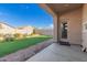 Backyard with artificial turf and covered patio at 4124 W Palace Station Rd, New River, AZ 85087