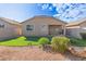 Artificial turf backyard with desert landscaping at 4124 W Palace Station Rd, New River, AZ 85087