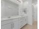 Clean bathroom with double vanity and tiled floor at 4124 W Palace Station Rd, New River, AZ 85087