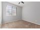 Bright bedroom with neutral walls and carpet at 4124 W Palace Station Rd, New River, AZ 85087