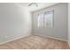 Cozy bedroom with carpeted floor and window coverings at 4124 W Palace Station Rd, New River, AZ 85087