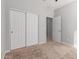 Bedroom with double door closet and carpet flooring at 4124 W Palace Station Rd, New River, AZ 85087