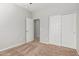 Spacious bedroom with double door closet and neutral decor at 4124 W Palace Station Rd, New River, AZ 85087