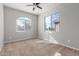 Charming bedroom with neutral walls and ceiling fan at 4124 W Palace Station Rd, New River, AZ 85087