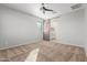 Bright bedroom with carpeted floor and ceiling fan at 4124 W Palace Station Rd, New River, AZ 85087