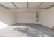Spacious garage with white painted walls at 4124 W Palace Station Rd, New River, AZ 85087