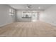 Spacious living room with neutral carpeting and a ceiling fan at 4124 W Palace Station Rd, New River, AZ 85087