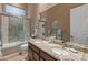 Bathroom with double vanity and a tub/shower combo at 41717 N Harbour Town Way, Anthem, AZ 85086