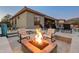 Cozy up by the fire pit on cool evenings at 41717 N Harbour Town Way, Anthem, AZ 85086