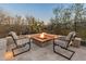 Relaxing fire pit area with comfortable seating at 41717 N Harbour Town Way, Anthem, AZ 85086