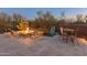 Outdoor fire pit and seating area with a table at 41717 N Harbour Town Way, Anthem, AZ 85086