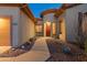 Welcoming front entrance with a red door and walkway at 41717 N Harbour Town Way, Anthem, AZ 85086