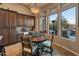 Kitchen breakfast nook with views of backyard and pool area at 41717 N Harbour Town Way, Anthem, AZ 85086