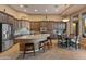 Gourmet kitchen with granite countertops and ample cabinetry at 41717 N Harbour Town Way, Anthem, AZ 85086