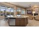 Open kitchen with large island, perfect for entertaining at 41717 N Harbour Town Way, Anthem, AZ 85086