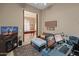 Spacious home office with a view into a game room at 41717 N Harbour Town Way, Anthem, AZ 85086